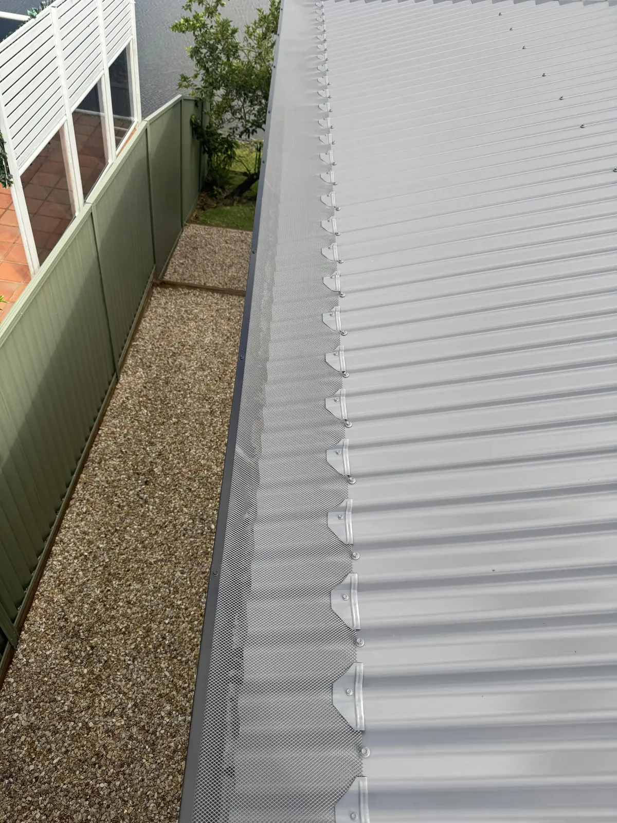 Aluminium mesh installed on a tiled roof edge